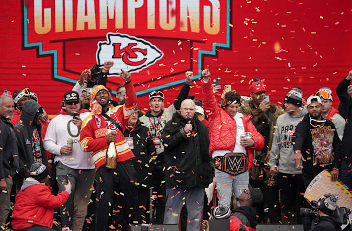 Feb 15, 2023; St. Louis, MO, USA; Kansas City Chiefs head coach Andy Reid celebrates with quarterback Patrick Mahomes (15) and other players during the Kansas City Chiefs Super Bowl parade. Mandatory Credit: Denny Medley-USA TODAY Sports